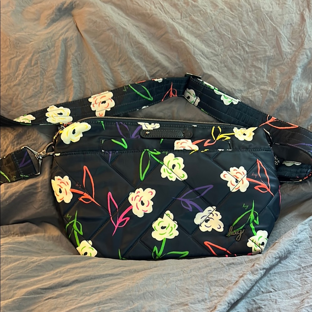 Lug Blue Crossbody Bag with Floral Charm